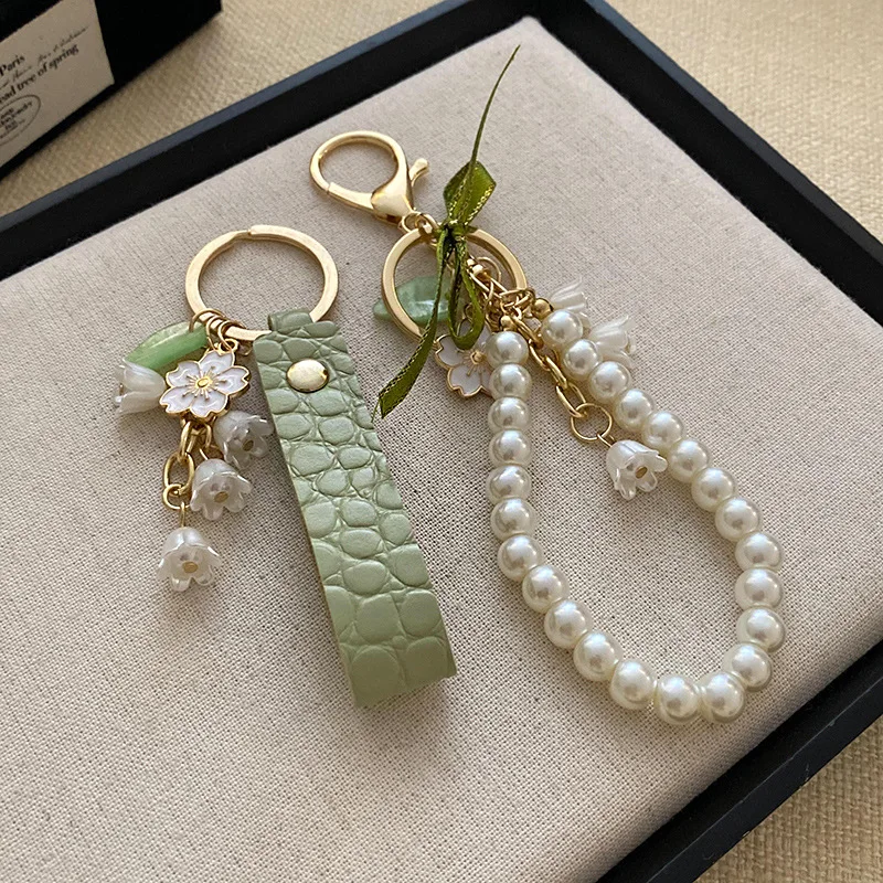 1/2 قطعة Ins الشريط الأخضر الغابات تحت عنوان فستان عيد ميلاد قلادة ، ملحق محرك فلاش USB ، مكافحة فقدان زنبق الوادي قلادة