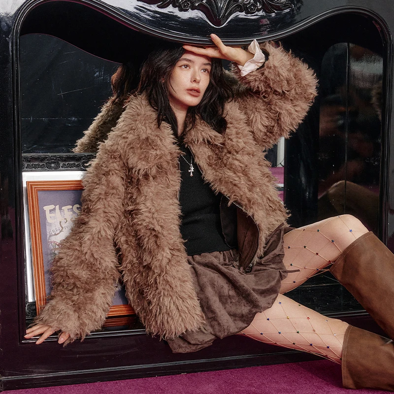 ELFSACK 2025 คอลเลคชั่นฤดูหนาวใหม่ กระโปรงมินิสเกิร์ตผ้าสักหลาดแต่งโบว์น่ารัก สไตล์ลำลอง สำหรับผู้หญิง