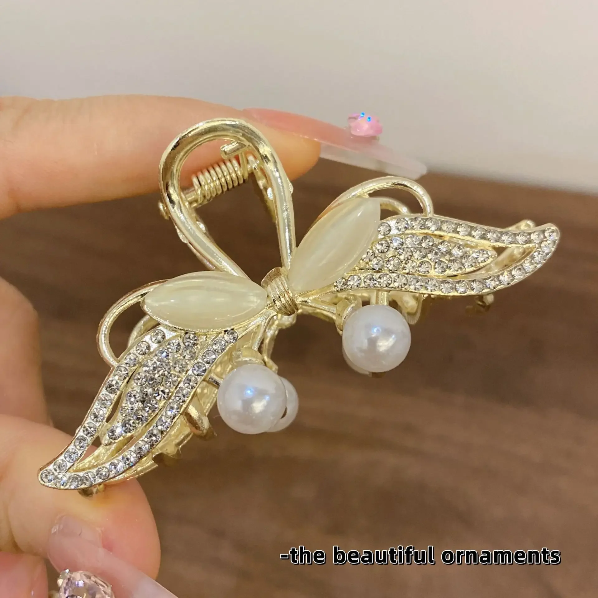 

Новый зажим для волос для женщин, имитация кошачьего глаза, бабочки, кристаллов, заколка для волос, головной убор с цветком, элегантные аксессуары для волос из сплава