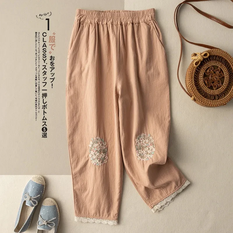 

Cotton and linen embroidered casual pants women's summer new fashion literary retro loose lace lace nine-point harem pants