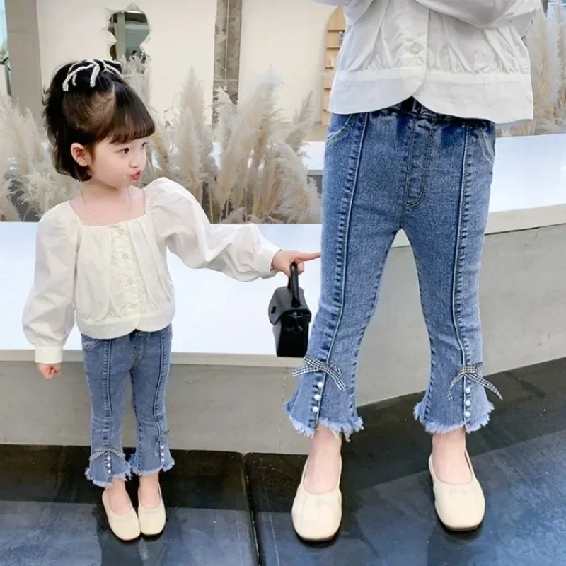 Korean Style Girls' Skinny Jeans for Spring and Autumn with Fashionable Slit and Stretchy Fabric