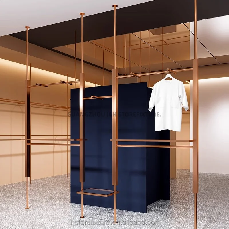 Estantes de exhibición de tienda de mujer de acero inoxidable de exhibición de tienda de mujer de oro rosa de tamaño personalizado para Boutique