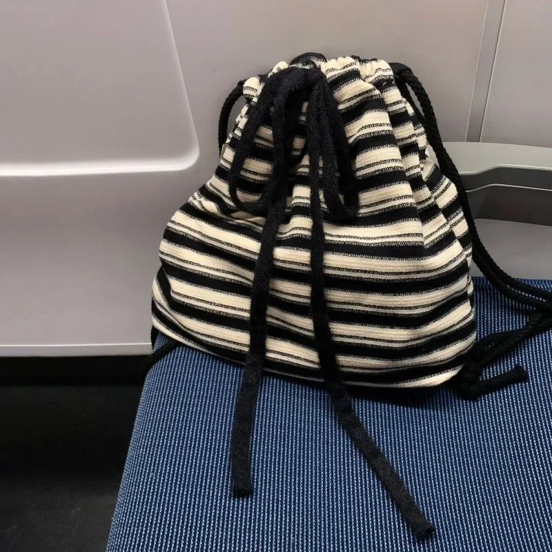 New Casual Black White Striped Canvas Backpack with Minimalist Design and Woven Straps Large Capacity Student Backpack for Class