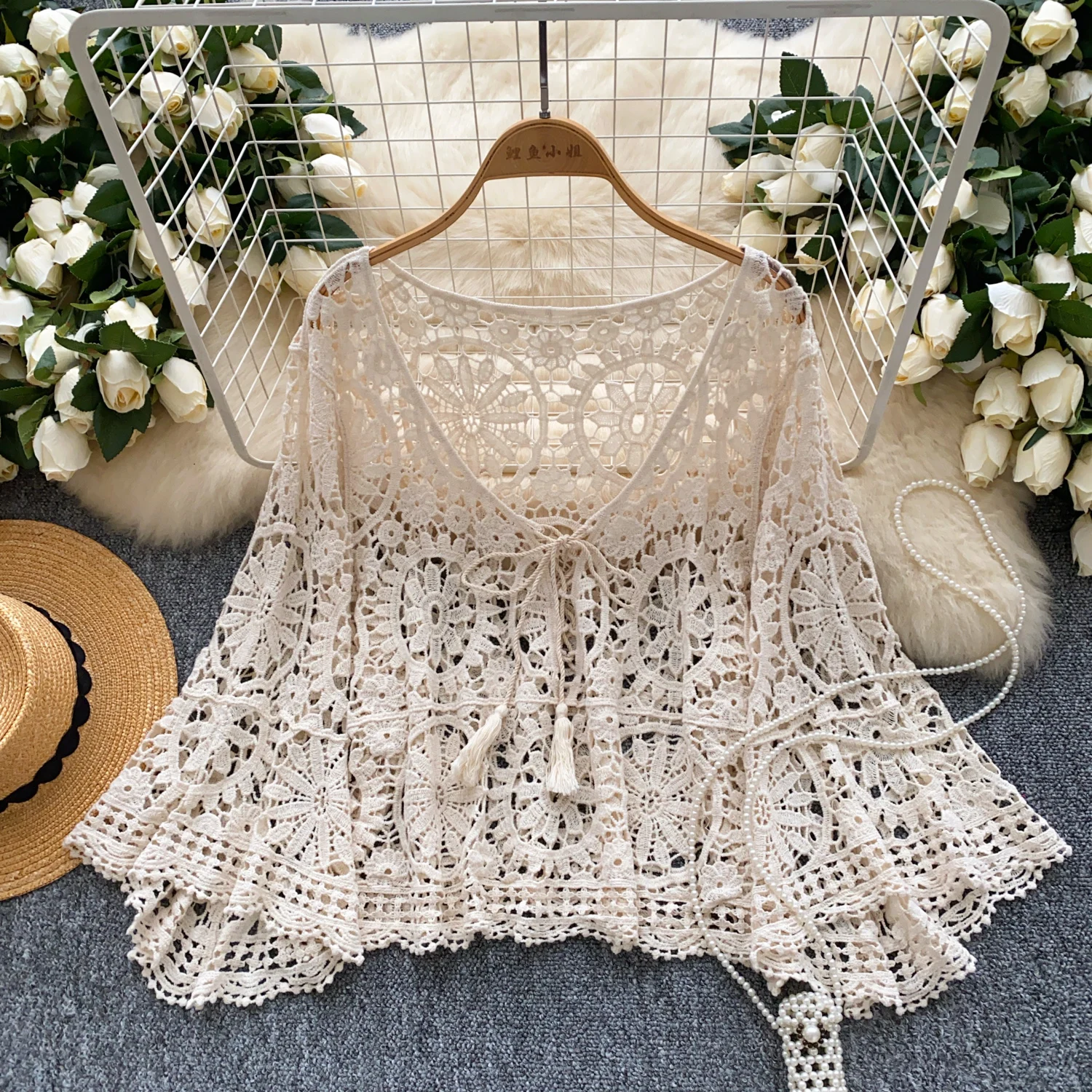 

2025 Spring And Autumn Seaside Vacation Knitted Tops Sun Protection Jacket Women's Bohemian Hollow Crochet Strap Loose Beach Top