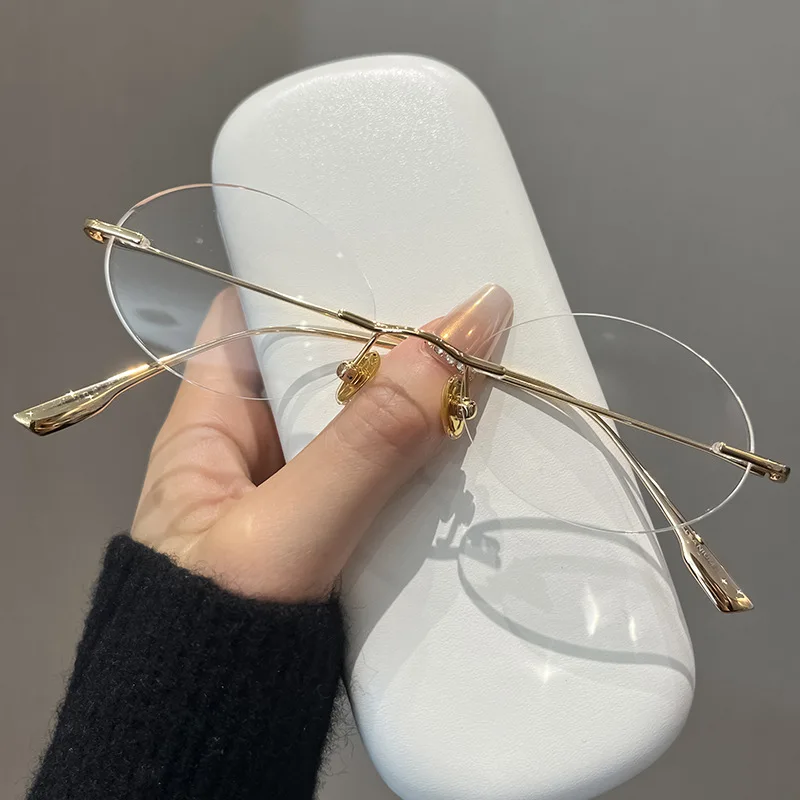 

Best-selling Oval-shaped Pure Titanium Spectacle Ladies Mens Rimless Eyeglass Temple High Quality 90% Blue Light Protection