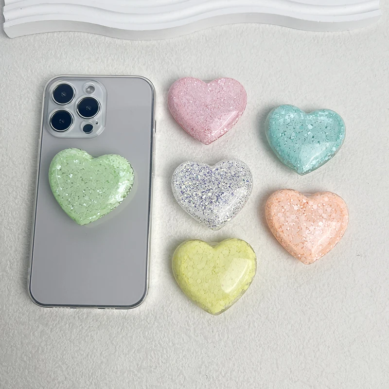 حامل هاتف على شكل قلب لامع جديد، حامل قابل للطي لسطح المكتب كسول، قبضة هاتف على شكل قلب لامع من ماكرون