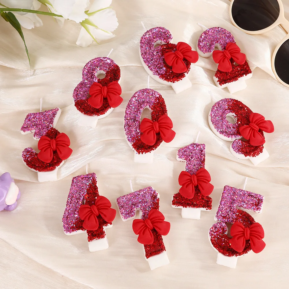Big red bow-shaped number birthday candles, magenta candles, party gifts, birthday and anniversary candles