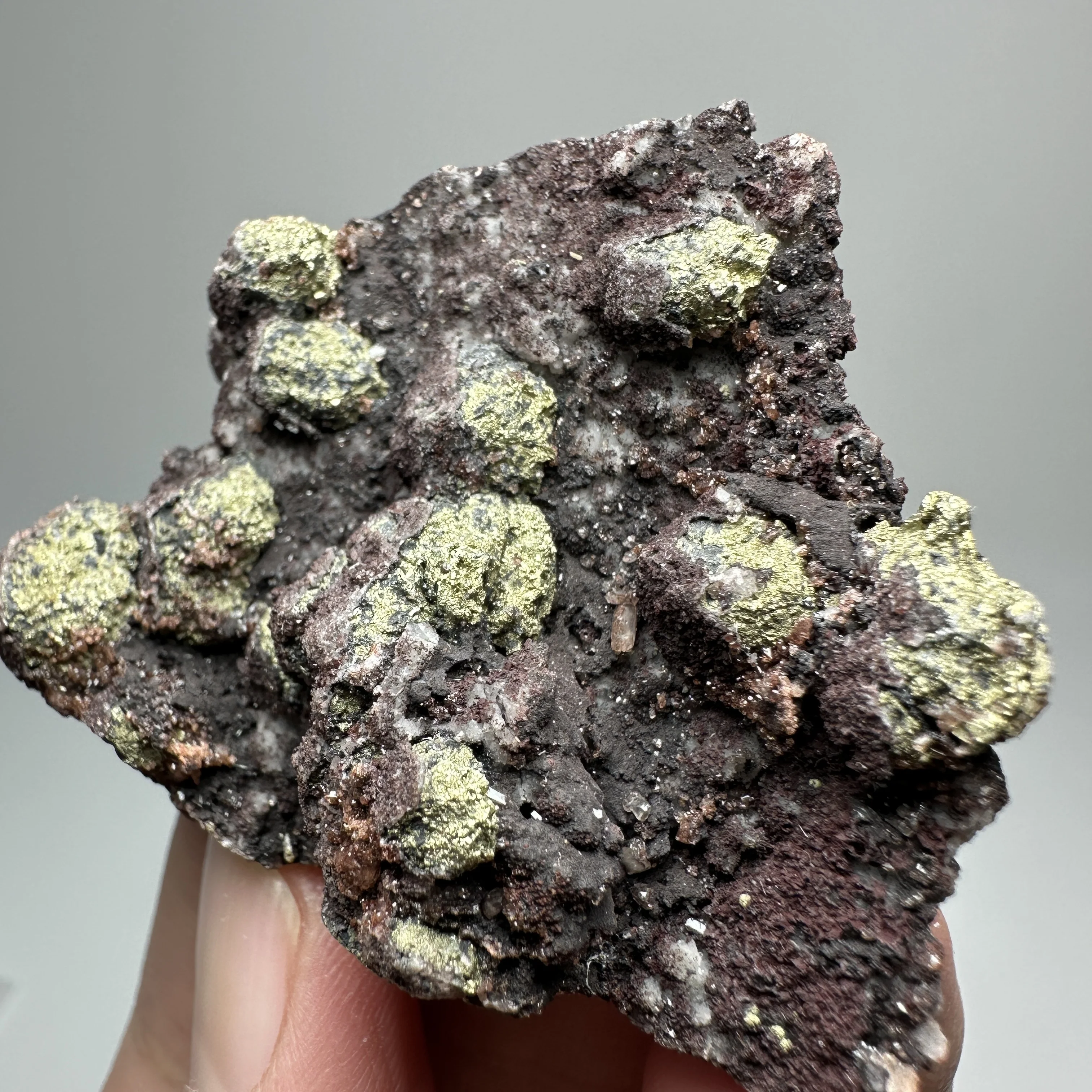 Natural brass ore is found in association with red crystal Crystal mineral specimens as home decoration items