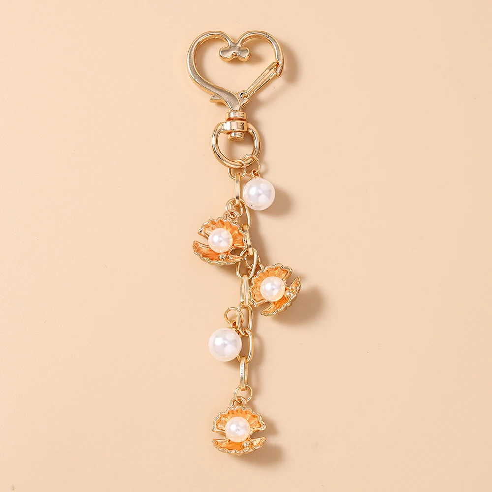Aihua Fashion Sommer Strand Muschel Schlüsselanhänger Perlenbesetzter Schlüsselring Anhänger für Frauen Mädchen Handtaschen-Deko DIY Schlüsselanhänger Schmuck – Detail 8