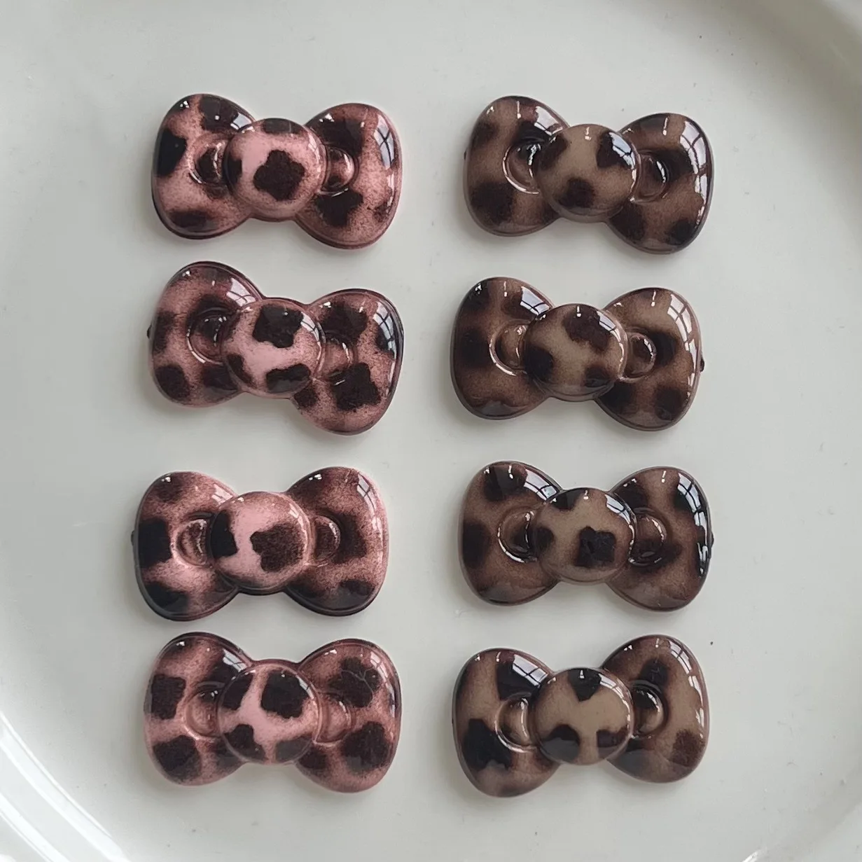 

5pcs Glossy leopard print bow small versatile DIY headgear mobile phone case decorative cream glue accessories hole shoes wholes
