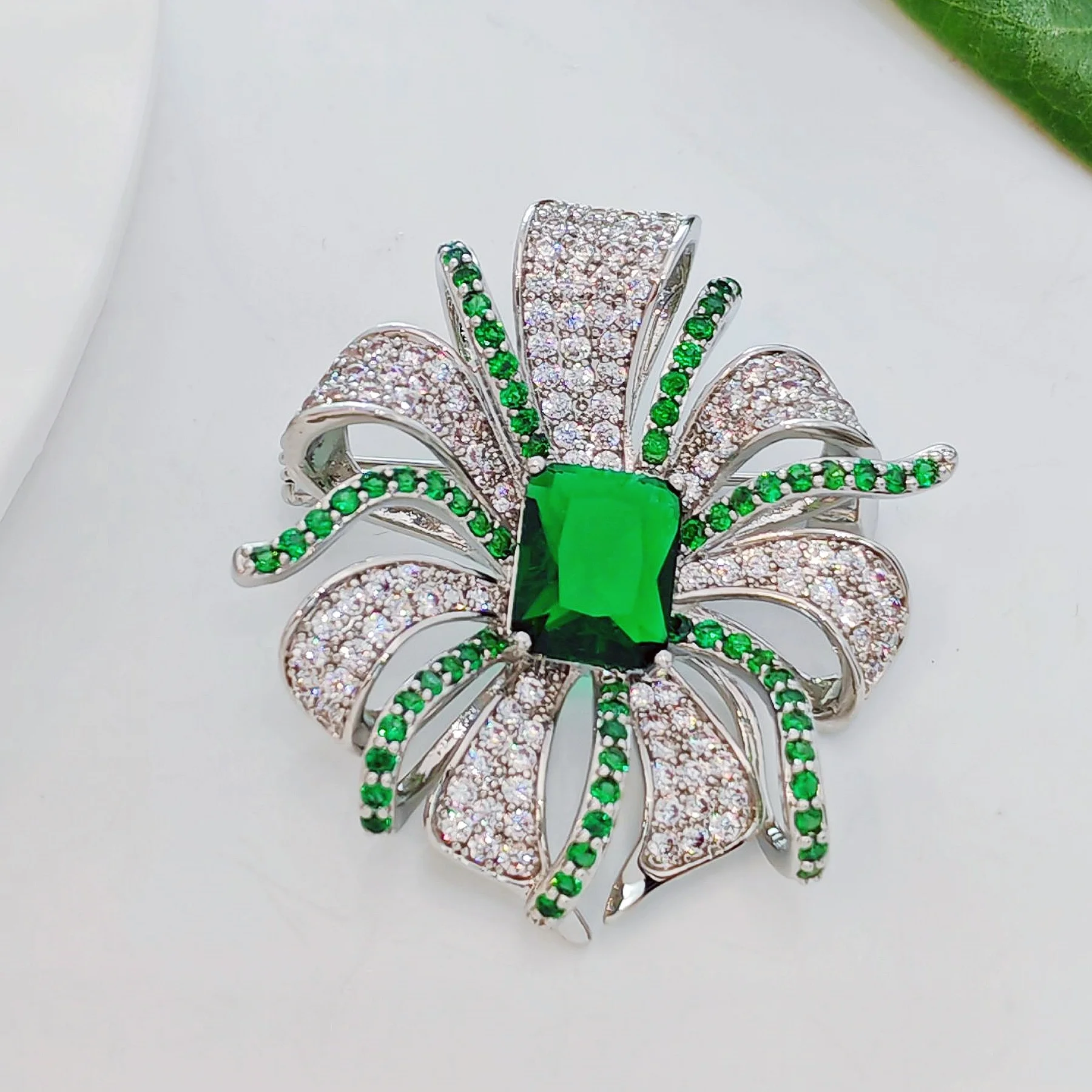 Flower Brooch with Green Main Stone and Curved Green Stamen – Micro Pave Zircon Flower Design