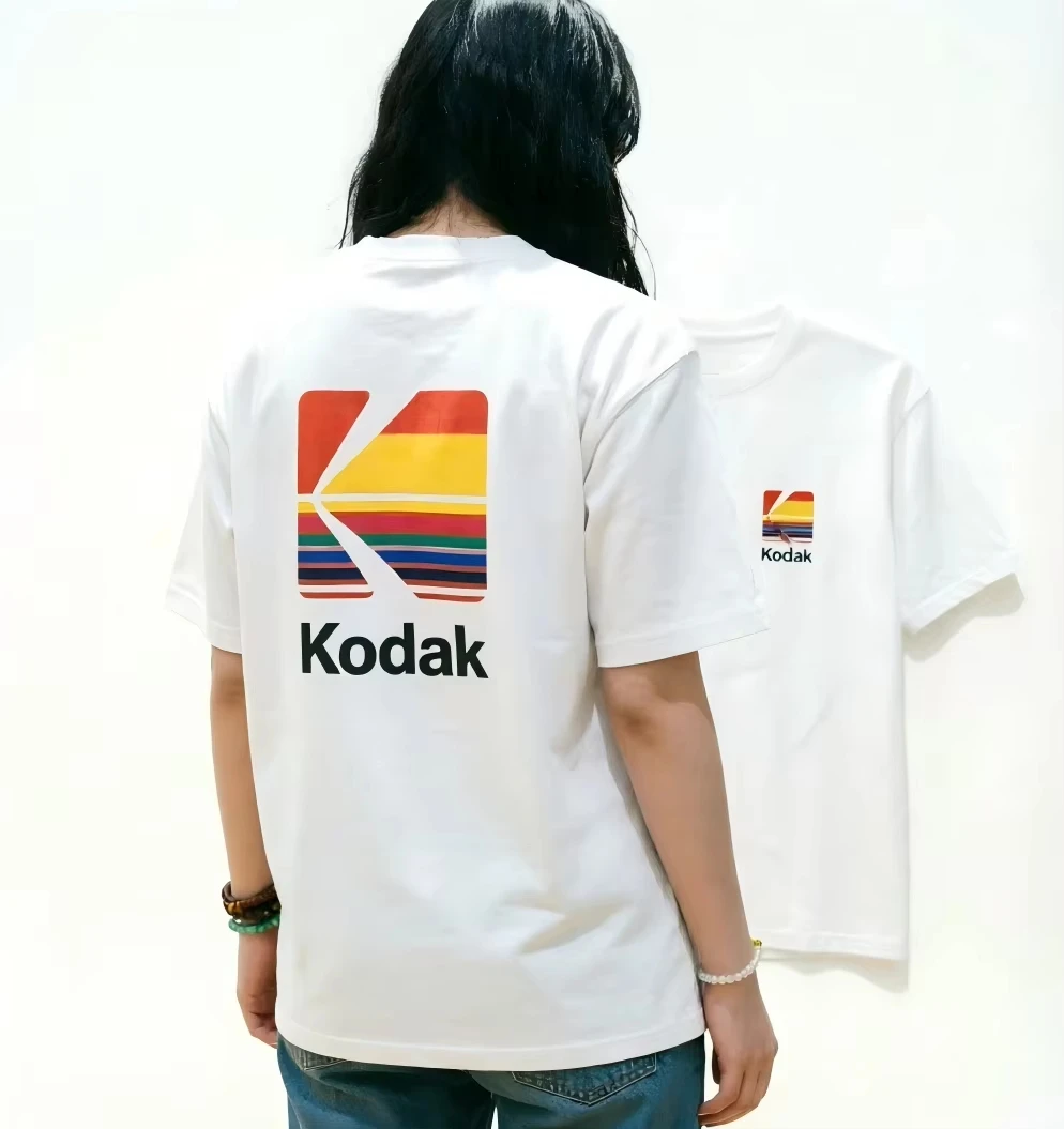 Camiseta Feminina Oversized de Algodão com Estampa Retrô Kodak Rainbow Logo, Estilo Coreano Streetwear, Top Casual de Verão para Homens 2026