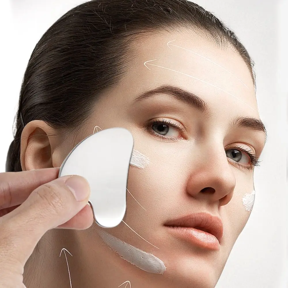 Nuevo Rascador Gua Sha de acero inoxidable, masajeador Facial Universal con forma de corazón, herramienta de masaje Guasha para belleza Facial, masaje de ojos