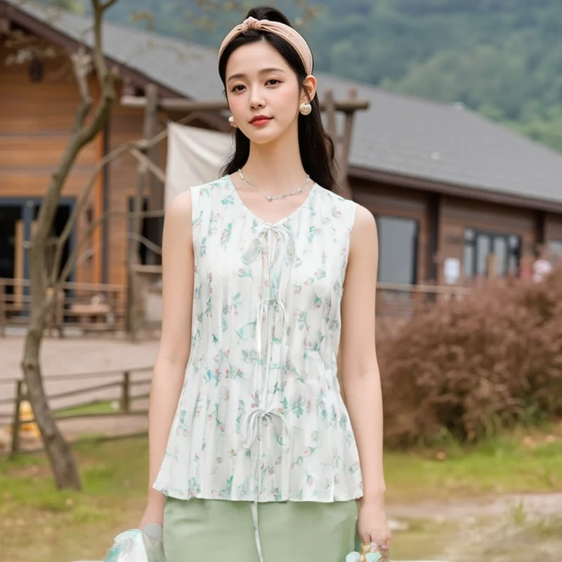 KEYANKETIAN 2025 Summer New Women's Flower Print Pleated Vest Holiday wind Hollow out Tied O-Neck Sleeveless Top Slim Camisole