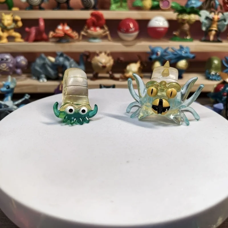 

PokéMon Transparent Pvc Model Electrode Voltorb Parasect Paras Omanyte Butterfree Piloswine Swinub Mini Collection Model Toys