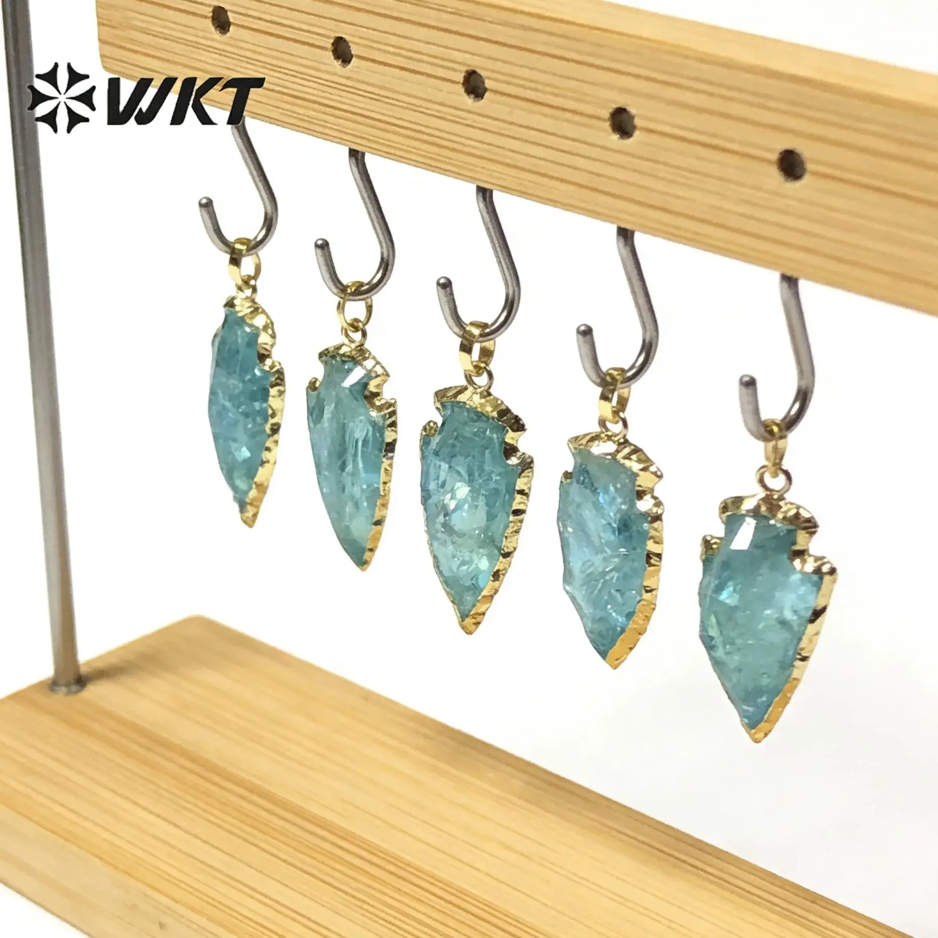 

WT-P1776 WKT Unique Design Natural Aqua Raw Crystal Quartz Pendant Blue Arrow Shape Pendant Ladies Pendant Necklace Earrings