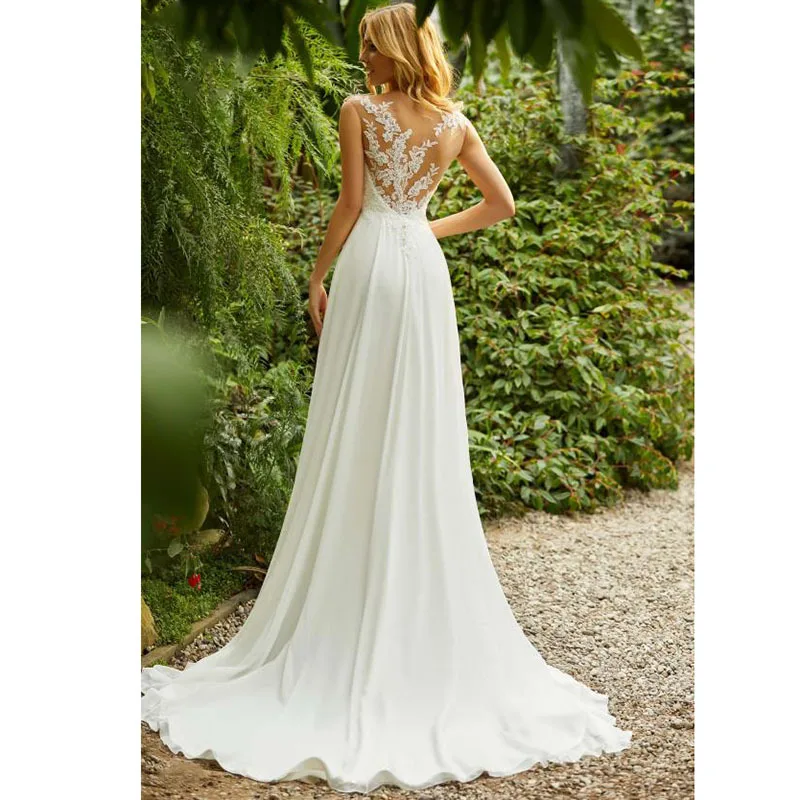 Wiosenna romantyczna suknia ślubna koronkowa szata De Mariée Illusion Backless Vestidos De Novia aplikacje Vestido De Noiva dostosowane