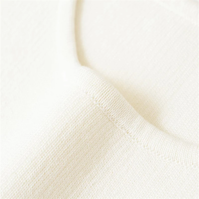 KEYANKETIAN letnia nowa damska złota ozdoba na guziki kamizelka z dzianiny styl rekreacyjny O-Neck sweter bez rękawów Camisole krótki top