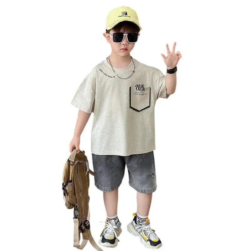 

Trendy Boys' Fashion T-shirt Set 2026 New Children's Summer Casual Short-sleeved Top with Denim Shorts Outfit for Big Kids