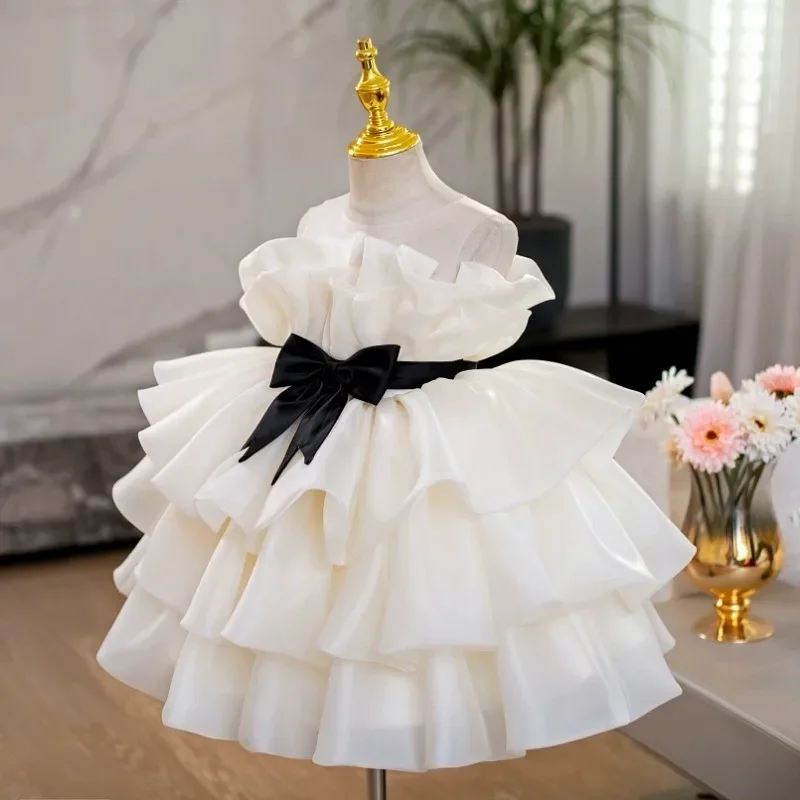 Abito da principessa in organza bianca per ragazze con volant a strati Abito da festa senza maniche con fiocco nero Perfetto per la ragazza di fiori di matrimonio di compleanno