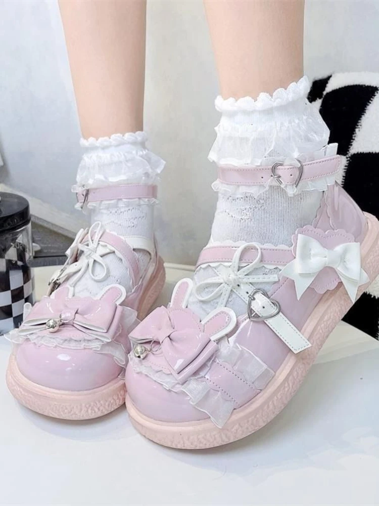 Sandali causali dolci e carini con fiocco rosa donna stile giapponese Lolita scarpe con punta tonda nastro da donna scarpe basse principessa Kawaii