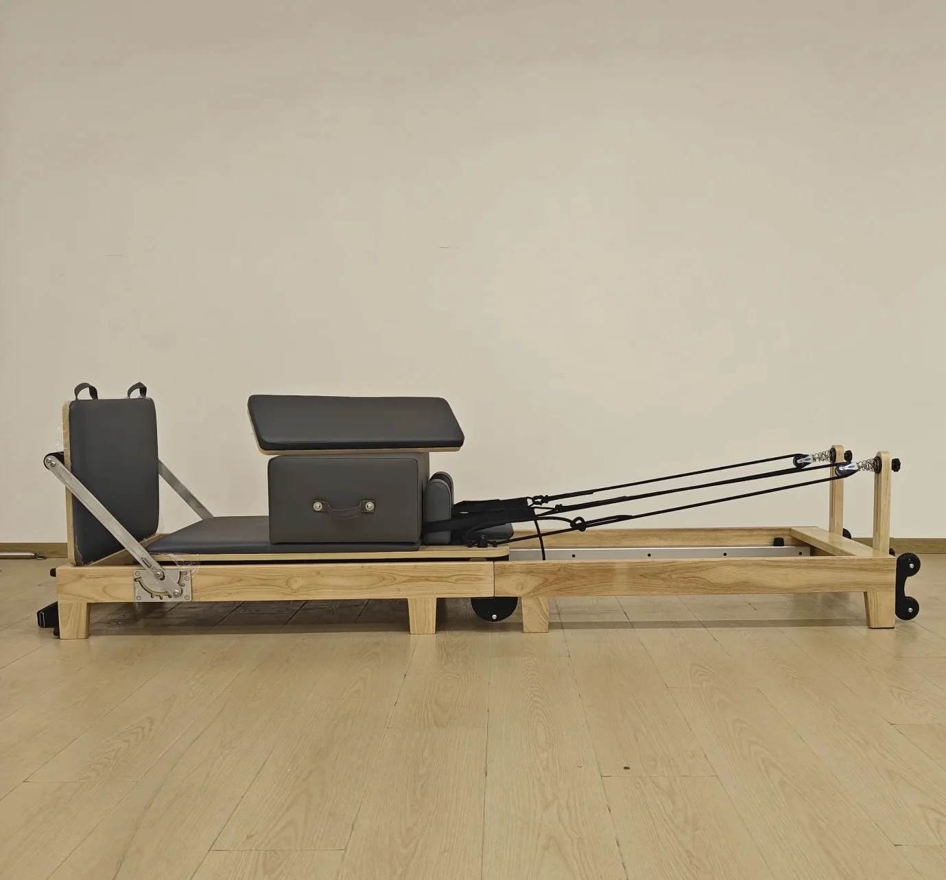 

Foldable Wooden Pilates Core Bed with Adjustable Resistance for Strength & Flexibility Training