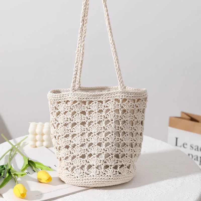 

Hollow cotton thread hand-woven bag Chi-style temperament one-shoulder hand-held straw bag seaside holiday beach bag purse 2022