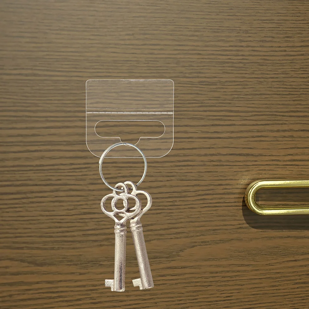 

100Pcs Clear Self-Adhesive Hanging Tabs Transparent Hooks Foldable Slot Hole Display Tags Retail Home Use Adhesive Hanging Hooks