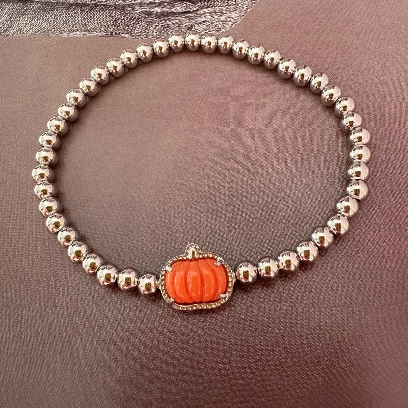 Europe and the United States fashion atmosphere sense of Halloween orange pumpkin copper ball stretch bracelet female jewelry