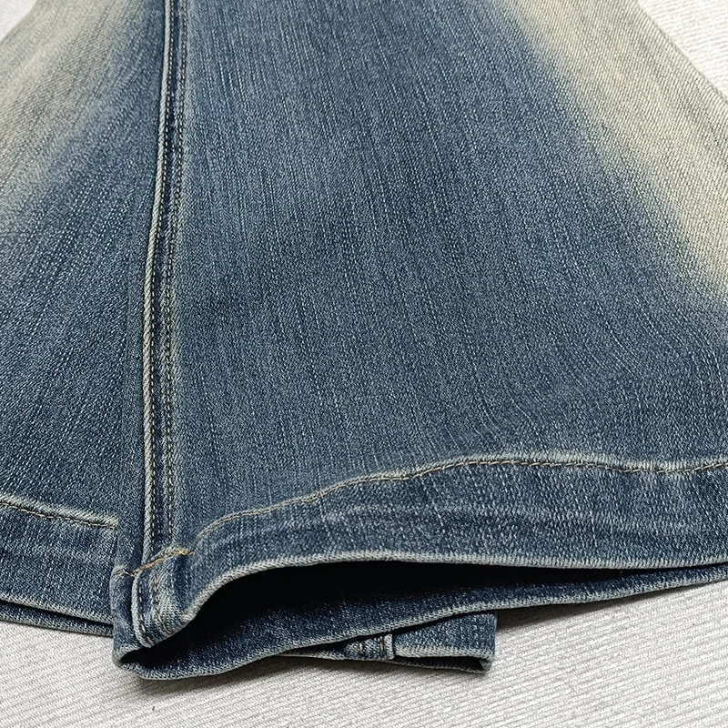 オーウェンシーカー男性のジーンズデニム綿男性服グラデーションフレアパンツ秋デザイナー高級長ズボン