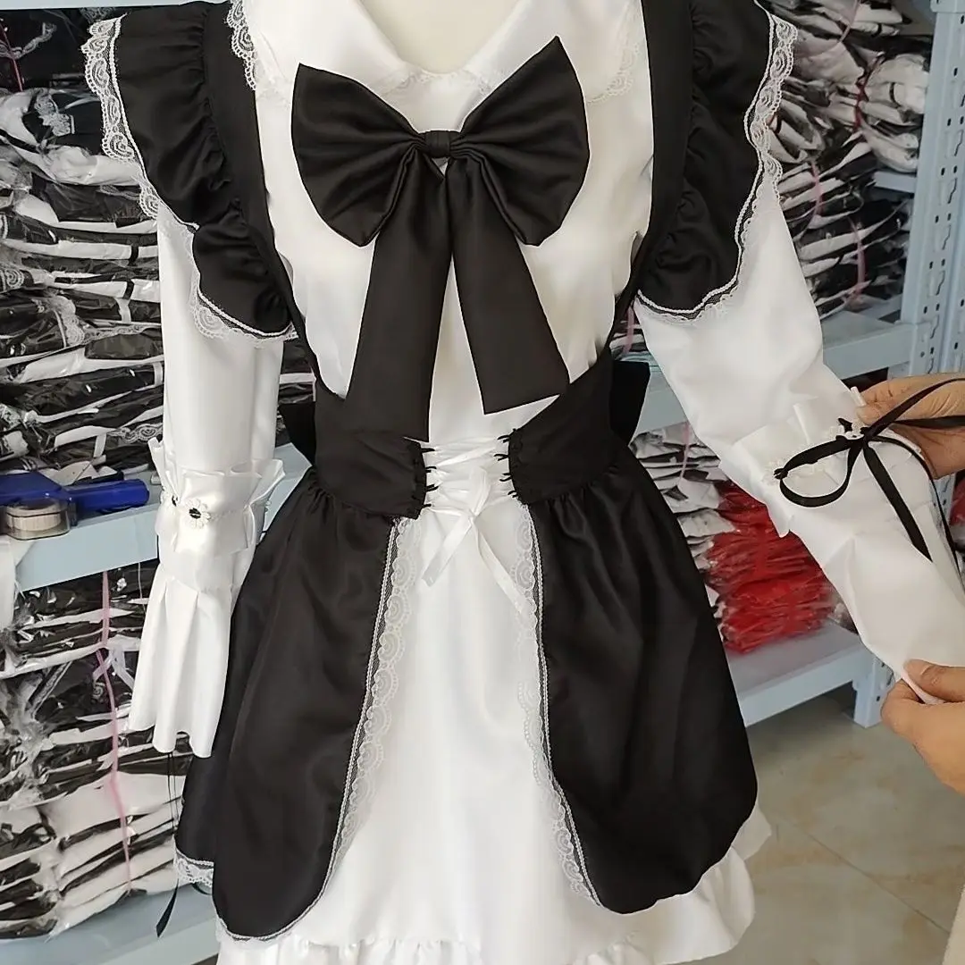 ผู้หญิงชุดแม่บ้าน Lolita คอสเพลย์น่ารักเซ็กซี่เร้าอารมณ์ Kawaii Cafe เครื่องแต่งกายสีดําสีขาวชายชุดผ้ากันเปื้อนน่ารัก Bowknot