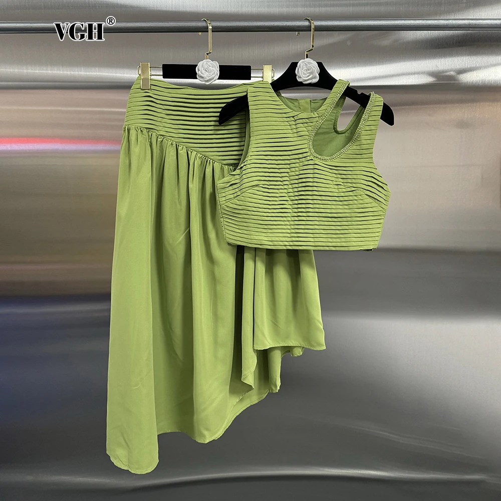 

VGH Casual Folds Two Piece Set For Women Round Neck Sleeveless Hollow Out Top High Waist Irregular Hem Skirt Slim Sets Female