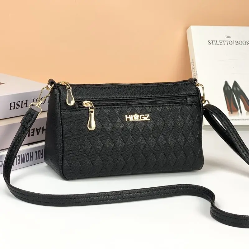 

Multi-layer middle-aged women's women's shoulder messenger large-capacity bags.