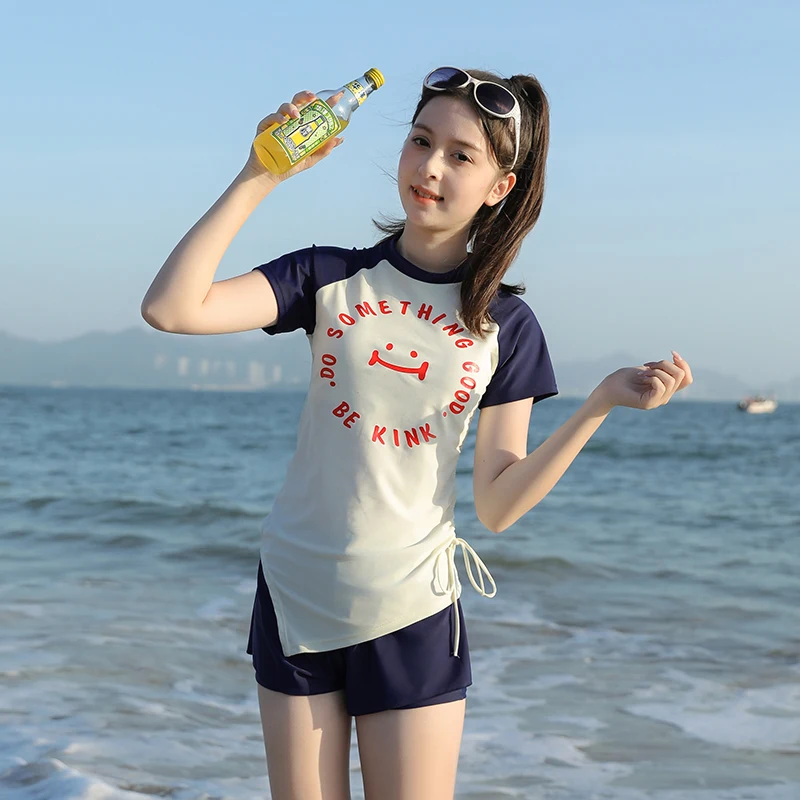 The new Korean summer split skirt is cute for big children and girls in small fresh swimsuits and beach sunscreen swimsuits