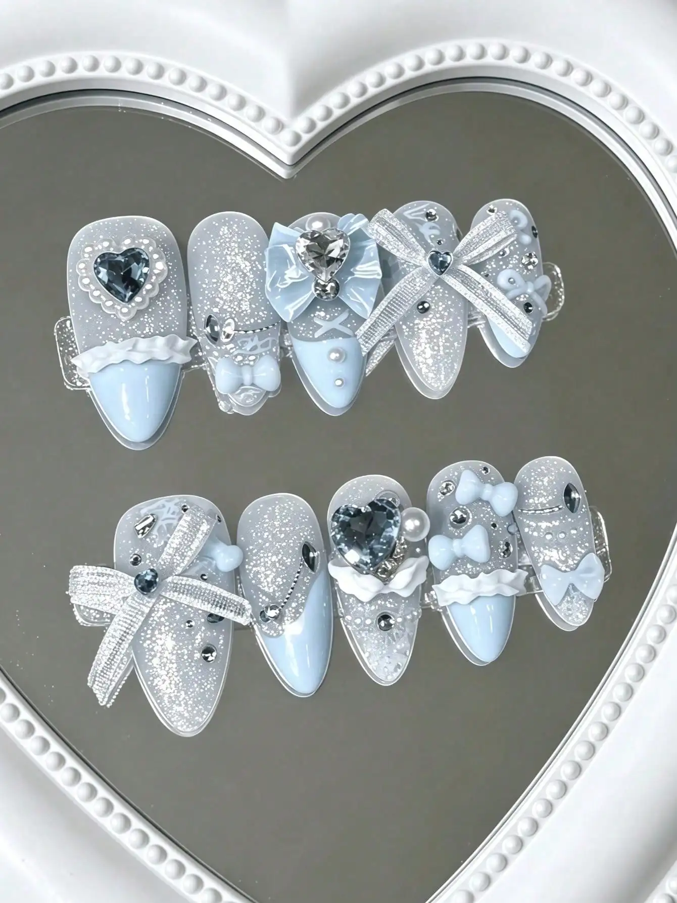 10 Pieces of Handmade Almond-Shaped Full-Cover Nail Tips, Medium Length, Light Blue with Silver Glitter, Color-Blocking Design with Glitter, Lace, 3D Hearts, Bows, Pearls, and Rhinestone Decorations, Sweet and Delicate Style, Suitable for Women and Girls, Perfect for Birthday Parties, Dates, and Other Casual Occasions, Also Ideal as a Gift, Includes 1 Piece of Jelly Glue and 1 Nail File