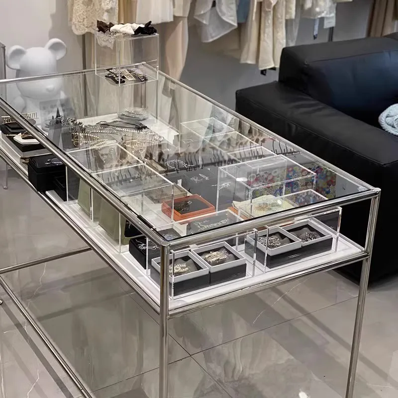 

Магазин одежды, ювелирный магазин, стеклянная витрина из нержавеющей стали, стеллаж Nakajima, реквизит для компьютерного стола посередине