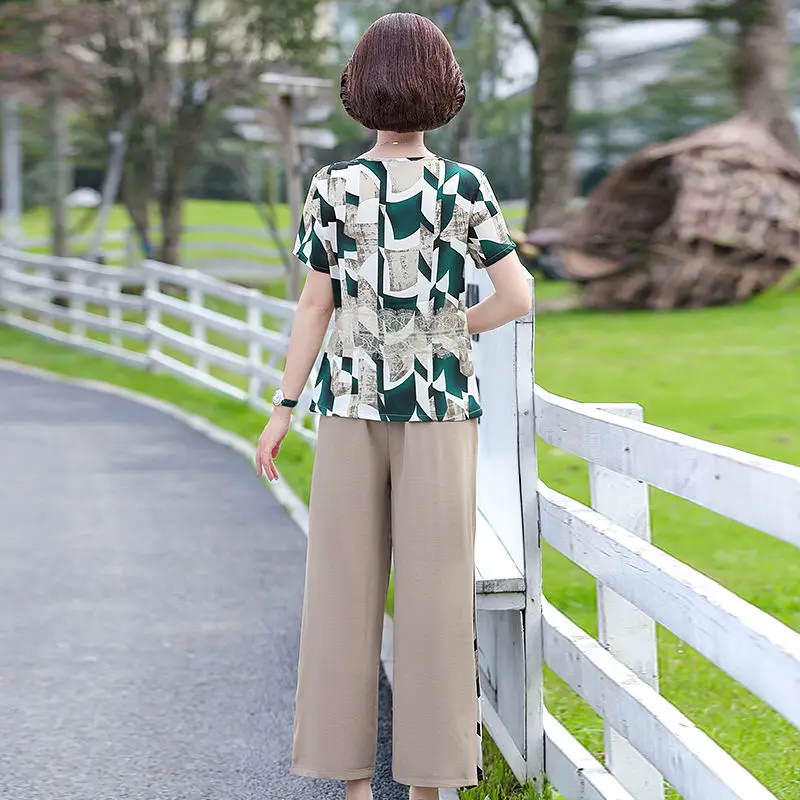 Modne koszule damskie z nadrukiem, luźny krój, nowy styl, szyfonowe, z krótkim rękawem.