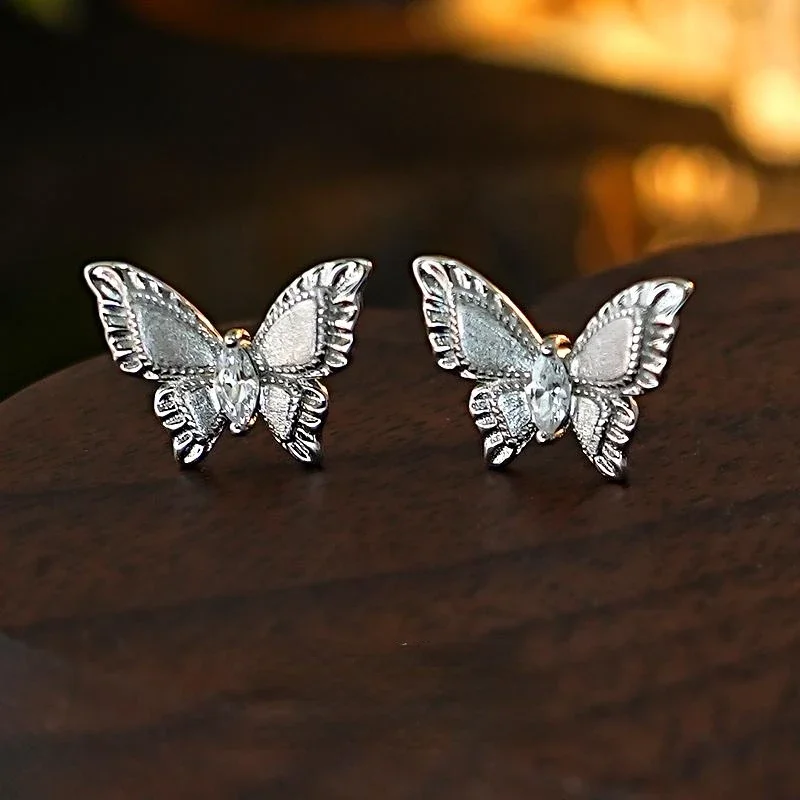 Metal brushed dreamy butterfly 925 silver ear nail, high-end feel, horse eye, niche temperament, versatile F