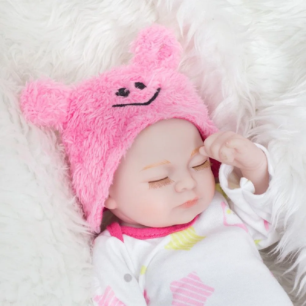 Paire de poupées Reborn en vinyle édition rare de 10 pouces |   Un œil ouvert et un œil fermé |   Bandeaux et compagnon en peluche bleu et rouge