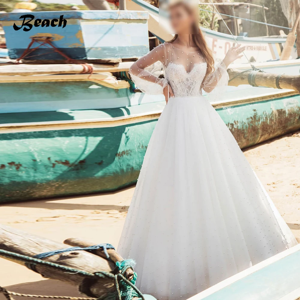 

Beach Wedding DressVestidos Elegant Wedding Dresses Tulle Illusion Pearls Appliques Bateau Full Sleeve Zipper Ball Bridal Gowns