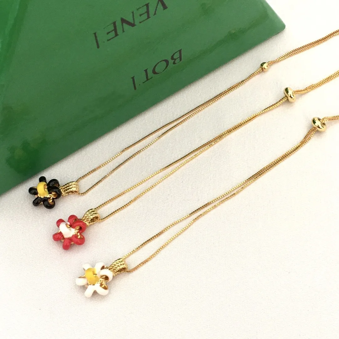 New enamel flower necklace with feminine charm, sweet and long drawstring sweater chain, colorful color blocked necklace