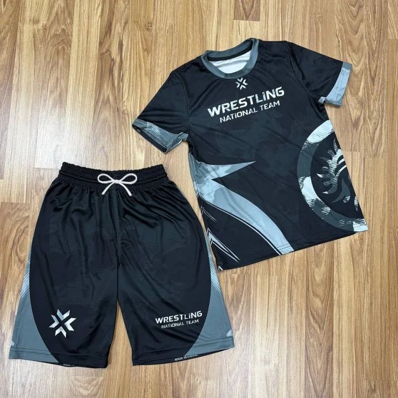Image of 2026 Neuer Kinder-Ringeranzug in Schwarz-Grau mit Farbblockdesign, Unisex Schnelltrocknend, Abriebfestes Shirt und Shorts Kampftrainingsanzug