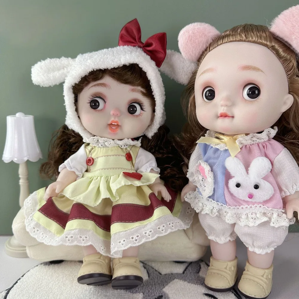 トレンドの28cmドール、28cmドール服、女の子のおもちゃギフト、DIY BJDドールドレス、交換可能な手作りドールストラップドレスセット、ぽっちゃり顔の女の子