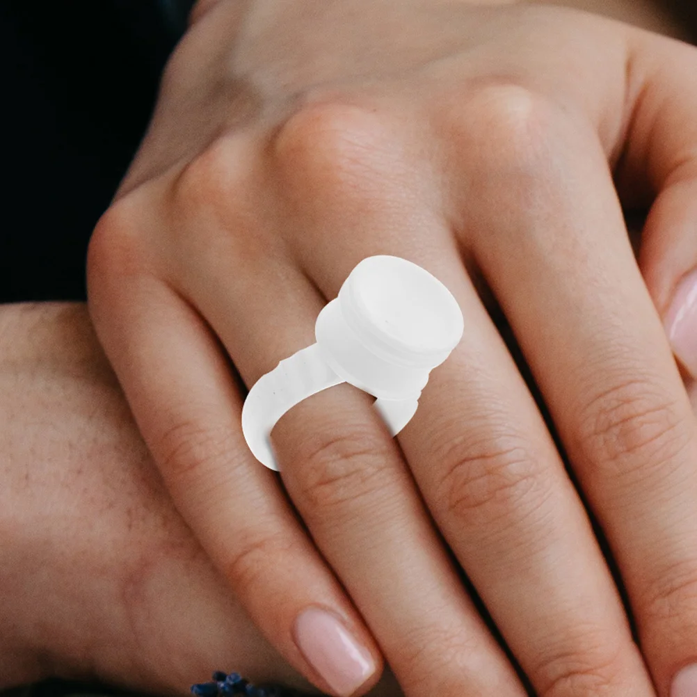 200 szt. Plastikowych pierścieni do rzęs, małe pojemniki na klej do efektywnego procesu przedłużania rzęs, wygodne dopasowanie na wszystkie palce.