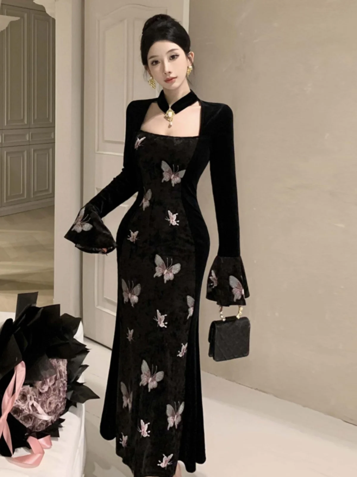 Falda de cola de pez de mariposa con estampado empalmado de terciopelo negro Vintage francés de gama alta para mujer primavera otoño Sexy falda larga ajustada calada