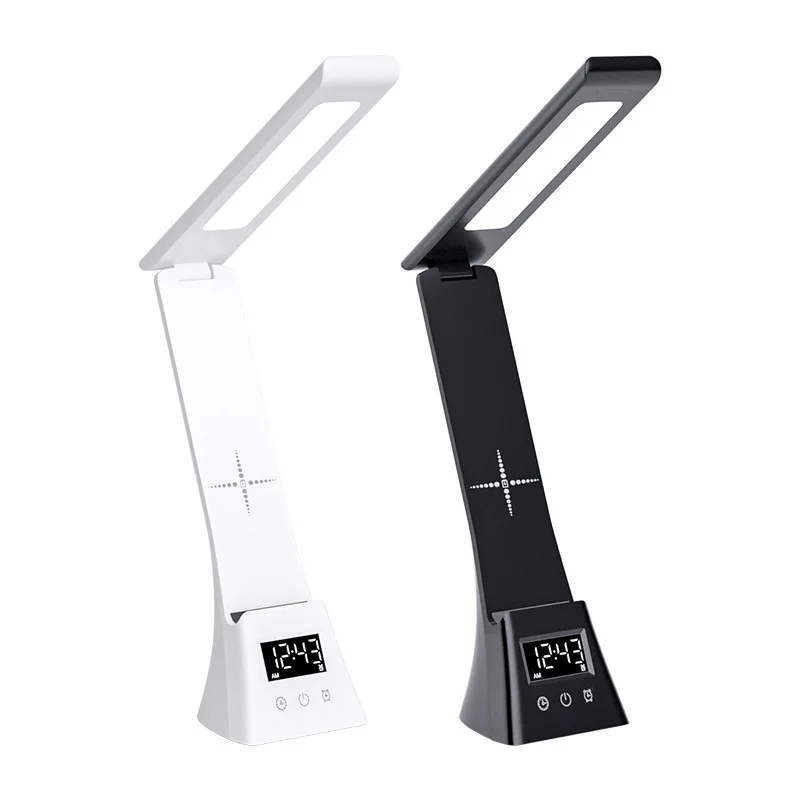 Multi-functional creative desktop folding desk lamp with wireless smartphone charging, designed for eye protection during study