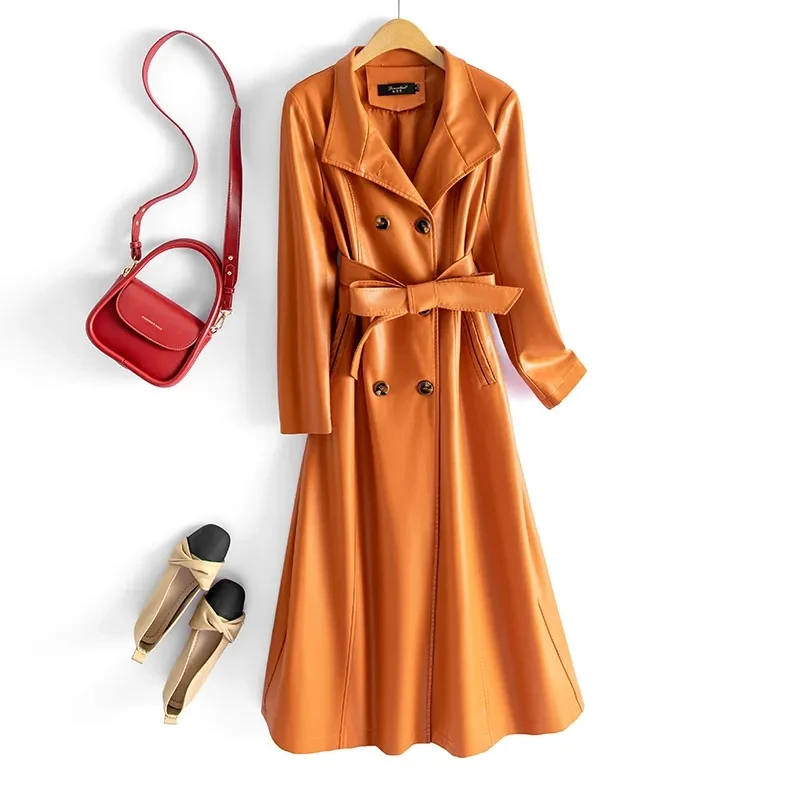 Trench da donna in pelle di pecora Autunno Inverno Moda Colletto alla coreana Doppio petto Cappotto lungo in pelle sottile con lacci Pelle divisa