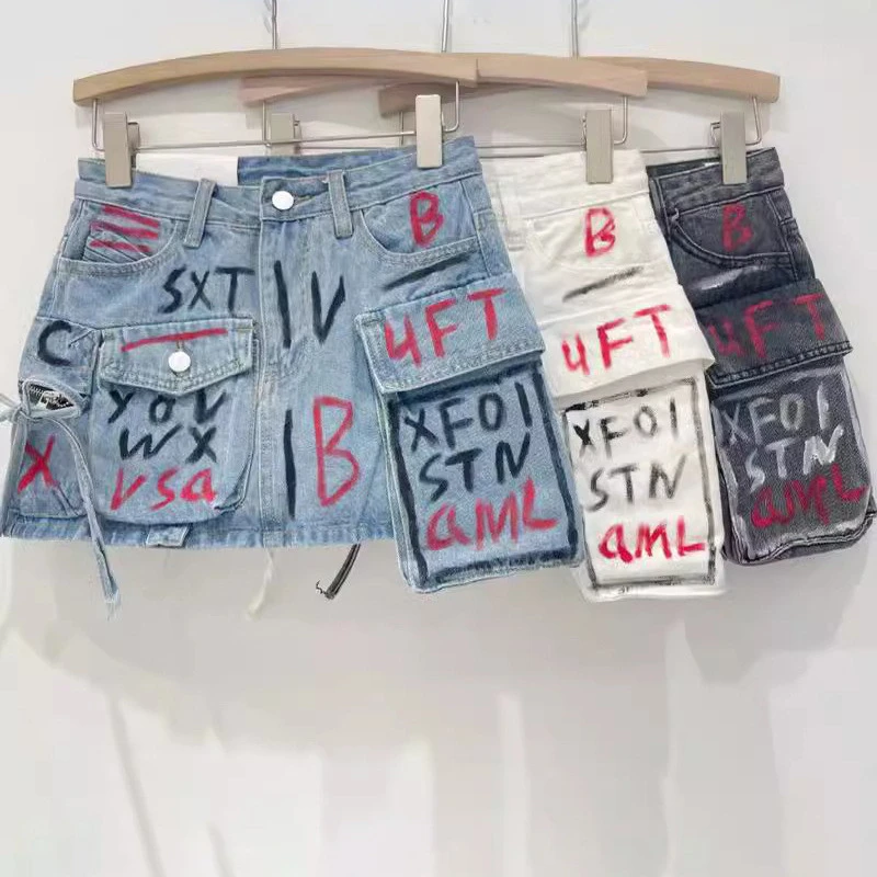 

New Hand Drawn Graffiti Print Pocket Denim Skirt 2024 New Irregular Workwear A-Line Buttocks Wrapped Short Skirt For Women