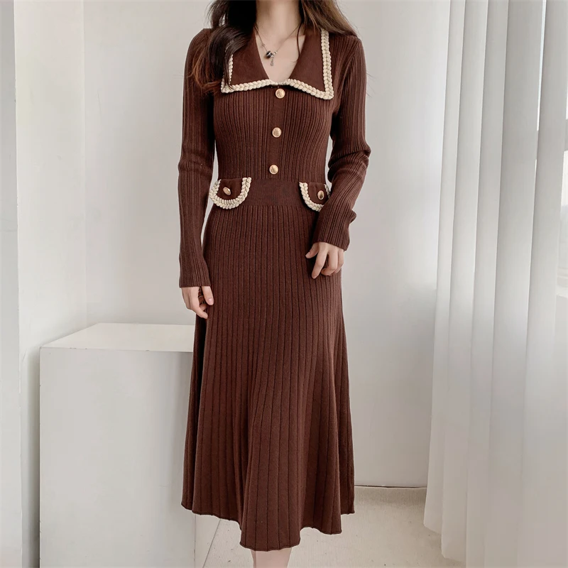 Vestido de suéter de punto con botones para mujer, vestidos largos de fiesta, cuello Polo, sentido de diseño de lujo, informal, francés, otoño, invierno, nuevo