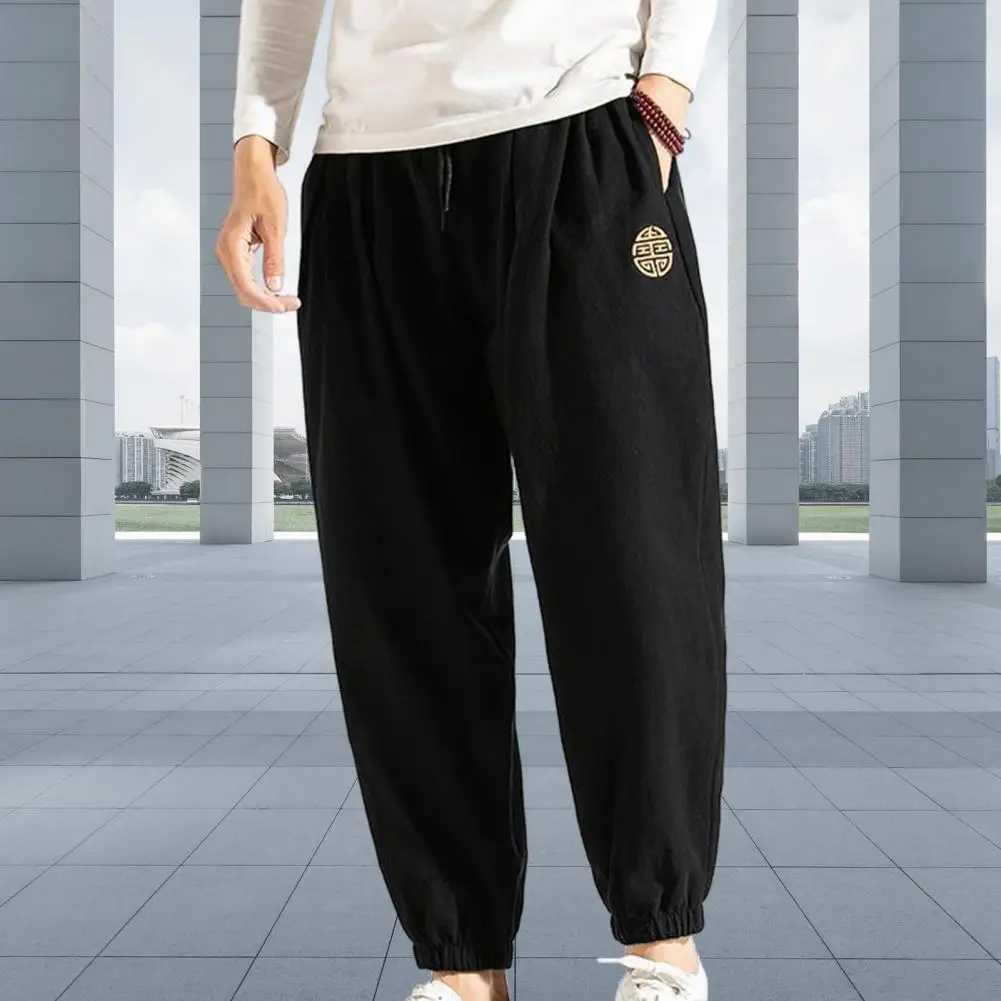 

Chinese Style Pants Chinese New Year Trousers Men's Loose Fit Ankle-banded Pants with Embroidered Pockets Elastic Waist Soft